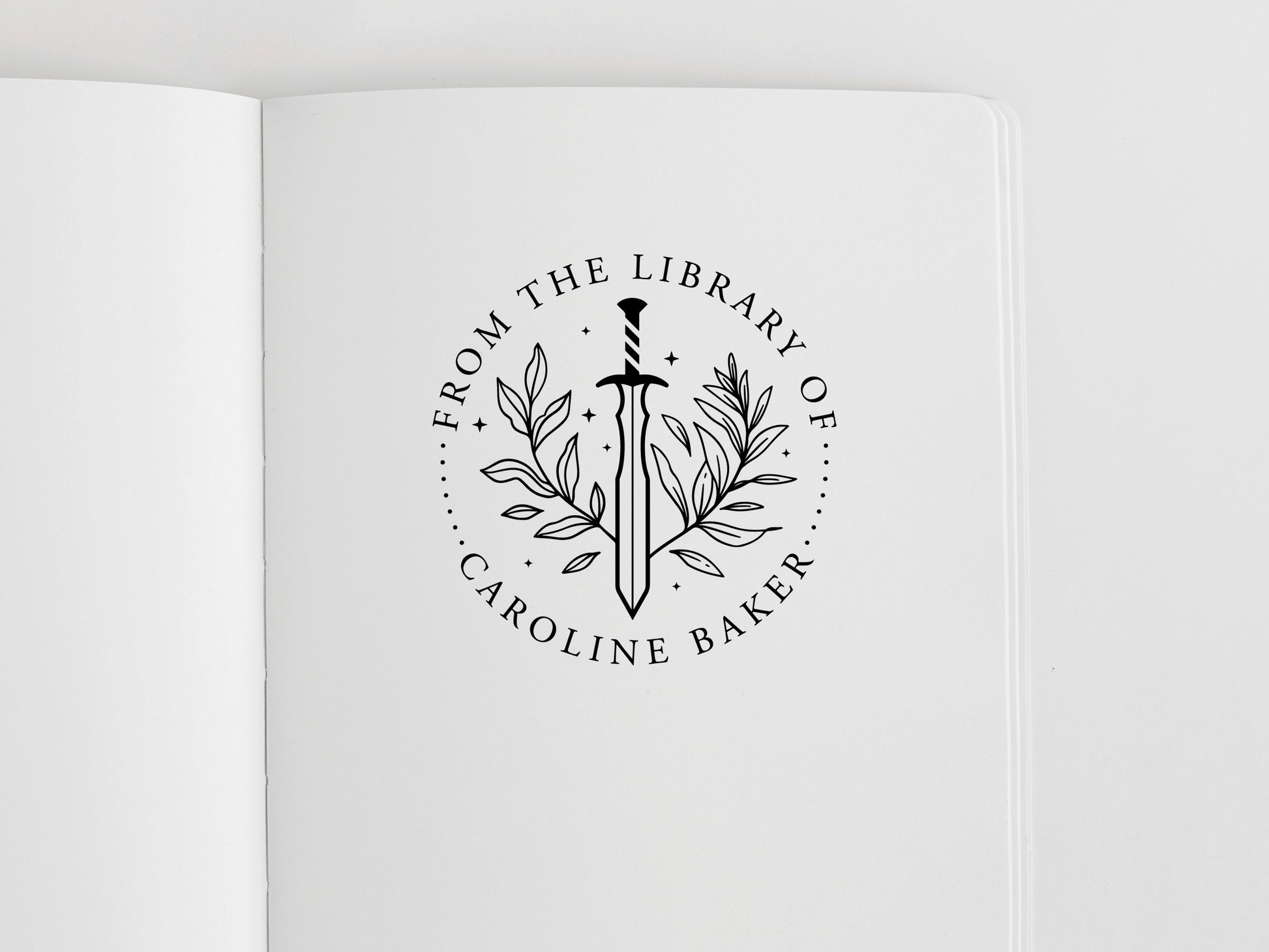 book stamp with a sword and a custom name