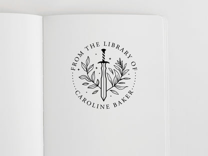 book stamp with a sword and a custom name